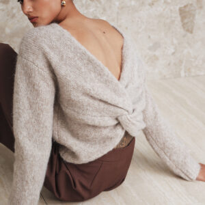 Wool blend sweater with twisted back