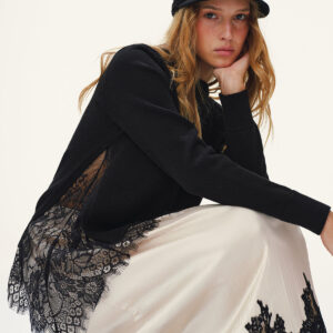 Knitted sweater with lace insert