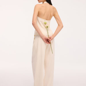 Set of a backless halter top with a bow detail and trousers
