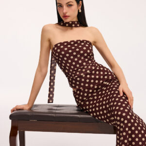 Set of a polka dot draped top and a maxi skirt.